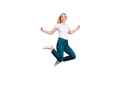 Full length body size view photo of charming cute active teen teenager have fun foolish fool trip summer holidays wear modern clothing trousers sneakers isolated grey background