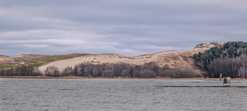 The natural wonder, Parnidis Dune, 52 meters high above sea level, the white dune on the coast of the Curonian Spit, located near the Lithuania-Russia border, as seen from Nida village, Lithuania
