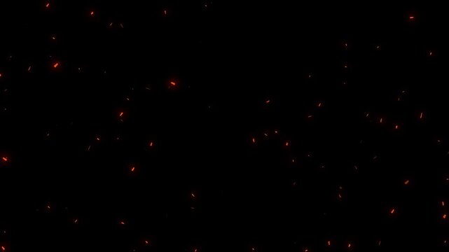 Realistic fire sparks flying through the air in slow motion, Bright red sparks rising from bottom on dark background. A flying fire particle spark from burning fire realistic movement