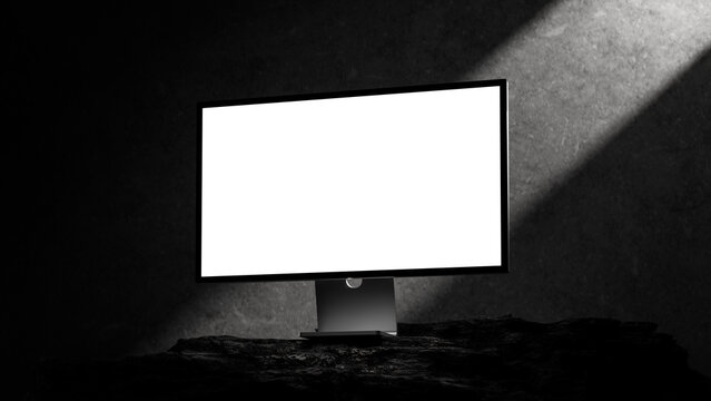 Dark minimalist desktop monitor mockup on black stone pedestal in moody studio lighting