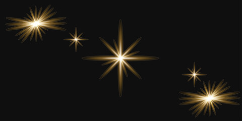 Fototapeta premium Golden Starburst Sparkle Light Effects on Black Background