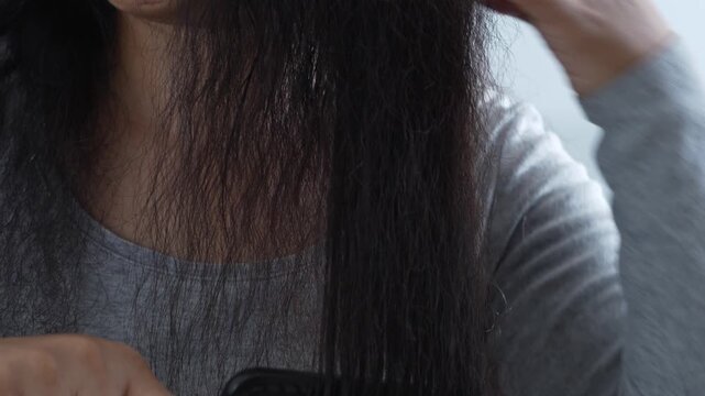 woman hair falling out and have many hair loss. problem of Damaged and frizzy. Healthcare and medical concept.	