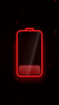 Low battery warning with glowing red symbol on dark background