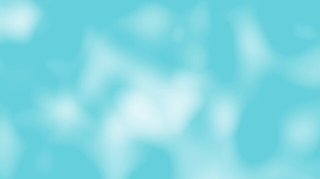 Soft blue abstract background with blurry white light spots and circular bokeh effect for a calm artistic design