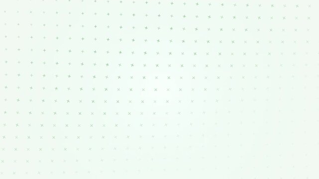 Abstract pattern of soft green crosses on a light background.