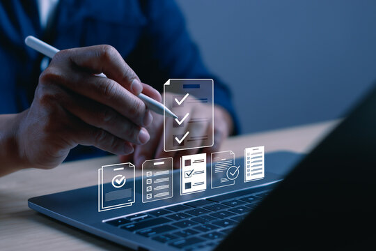 Business professional using digital pen on laptop with checklist and verified document icons, representing compliance, workflow management, task completion, document approval, audit and productivity