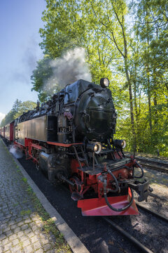 Historic Steam Locomotive with Puffing Smoke at Harz Narrow Gauge Railway Station