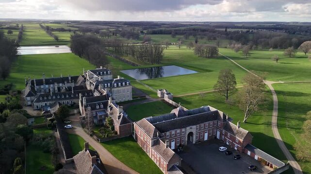 Aerial Drone Shot Over Boughton House Estate Buildings and Reflecting Pond Northamptonshire
