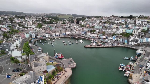 Stunning Aerial Drone View of Brixham Harbour Colourful Houses and Marina in Devon England