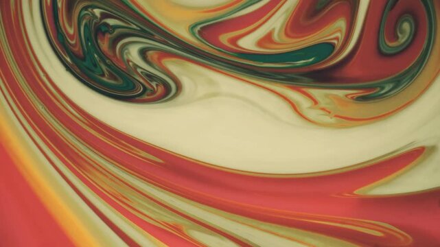 A fusion of orange, cream, and yellow hues, accented with touches of green, forms swirling patterns that shift gently, evoking a hypnotic, artistic, and psychedelic feel.