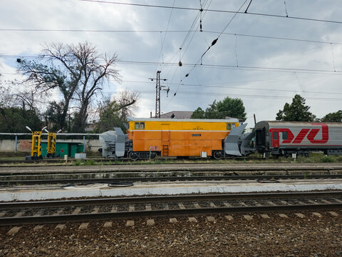 2026.07.21, Krasnodar Krai Russia Yellow Railway Snowplow Train Car on Tracks