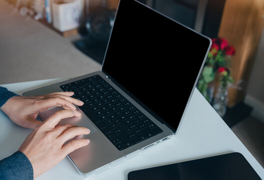 Business And Career Concept With Hands Using Laptop Mockup In Modern Home Office, Digital Era Workspace For Communication, Collaboration, Planning, Management, Small Business And Hybrid Work Culture.