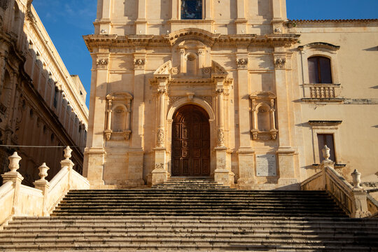 Noto, Italy; 1st October 2026: Piazza Immacolata with the Church of Saint Francis of Assisi and the old convent on the left.