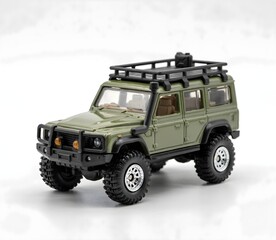 Obraz premium Green Die-Cast Off-Road 4x4 SUV Miniature Toy on White Background