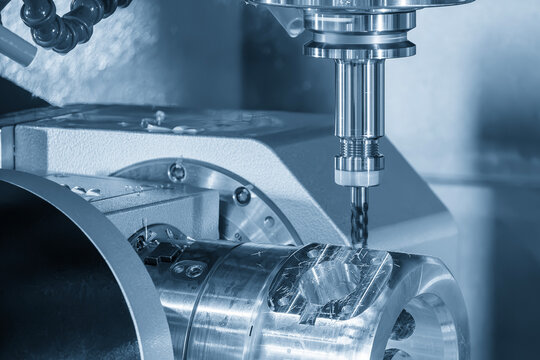 Flat area cutting on aluminum parts using flat nose end mill on 5 axis CNC machine in blue tone