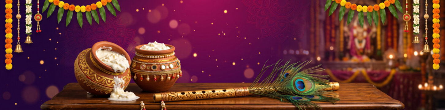 Krishna janmashtami celebration background with butter pots flute peacock feather on wooden table butter pot festival background hindu festival dahi handi