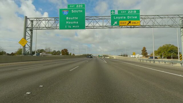Car Hood-Mounted POV Drive on Interstate 10 Between New Orleans and Baton Rouge Under Massive Puffy Clouds