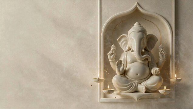 White Ganesha idol in marble niche with copy space