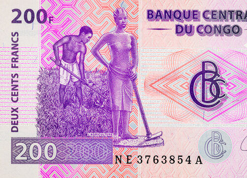 Congo 200 Congolese Francs banknote Features a man and a woman working in a field, symbolizing agriculture. African currency. Congolese money.