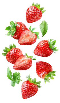 Whole strawberries and sliced halves floating separately with green leaves and sepals in a vertical arrangement isolated on transparent background.