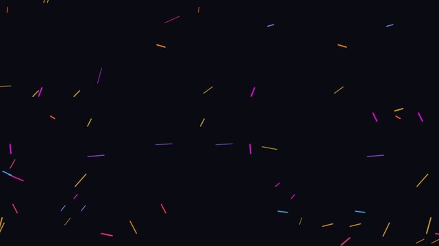 Abstract background featuring colorful sprinkles scattered randomly across a dark surface.