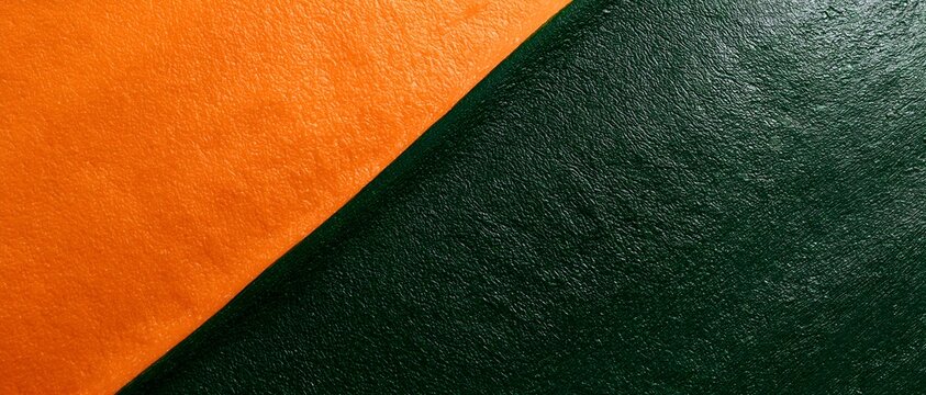 Vibrant orange meets deep green textured fabric in sharp diagonal divide