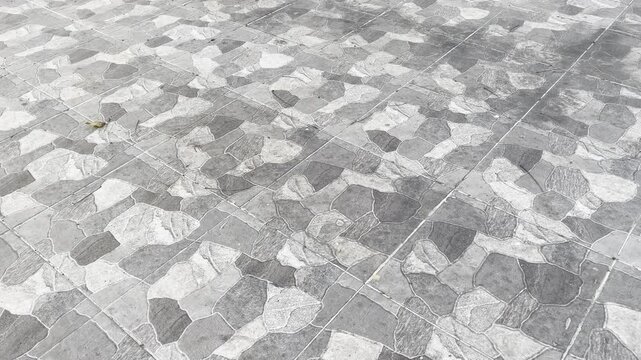 High angle wide view of ceramic floor tiles with rustic natural stone pattern