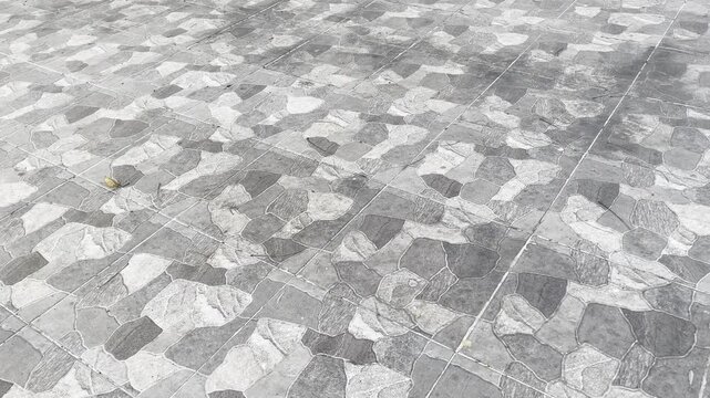 High angle texture of ceramic floor tiles with realistic natural stone pattern