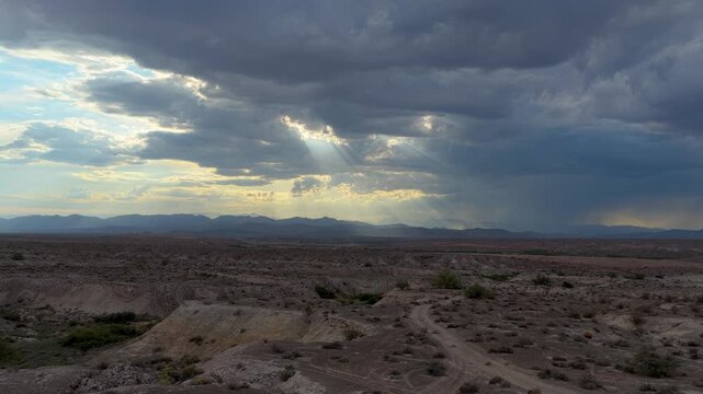 Aerial Nevada Desert Landscape Glendale Sun Rays and Dramatic Clouds Flyover
