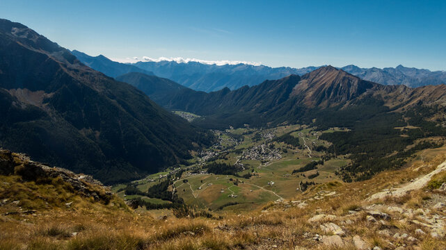 Panoramic aerial view of Val d'Ayas valley and villages from Monte Facciabella, Aosta Valley, Italy