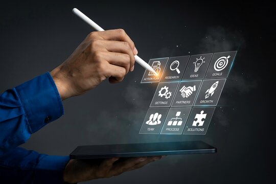 Close-up of a hand using a stylus on a digital tablet to select business strategy matrix icons