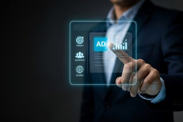 Obraz premium Man in a suit touches a glowing digital advertising interface with data charts and icons