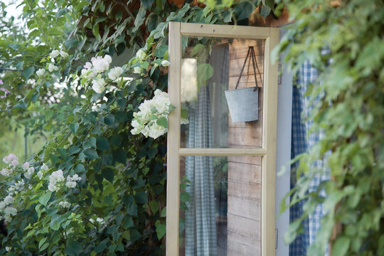 Closeup of a window on a wooden country house