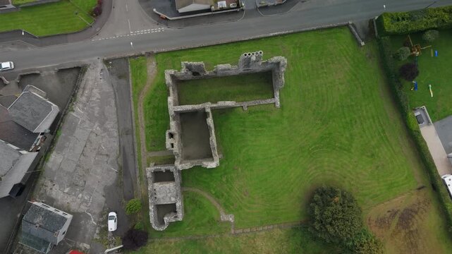 Birds eye view of the Castle Caulfield ruins and the road through Castlecaulfield village, County Tyrone, Northern Ireland