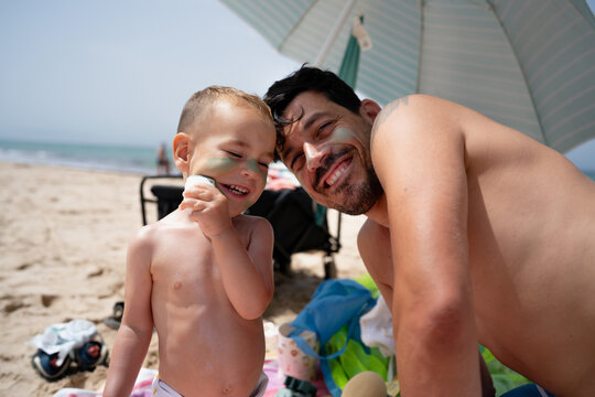Father and son at beach