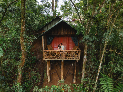 Romantic couple enjoying treehouse getaway in costa rica