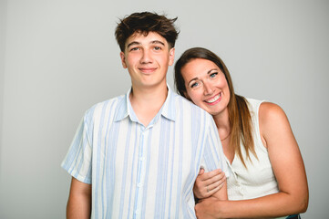 Fototapeta premium nice teen over white background on studio with mother
