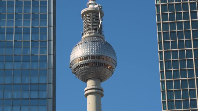 Berlin Alexanderplatz television tower between two buildings 4K