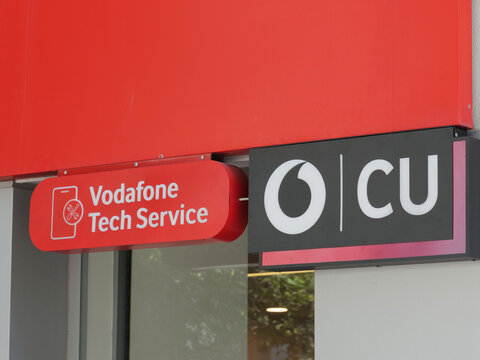  Greece, Rhodes, August 17. 2026, Vodafone Tech Service and CU mobile network brand logo signs