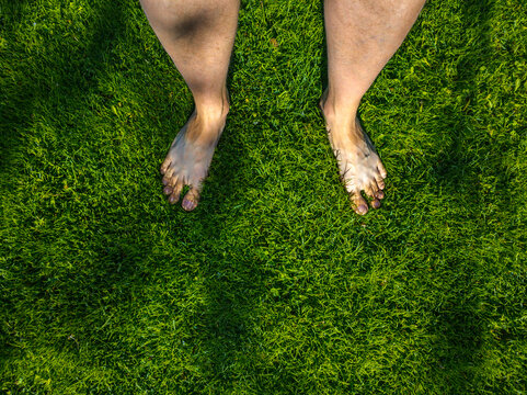 Bare Feet on Lush Green Grass in Kyrgyzstan