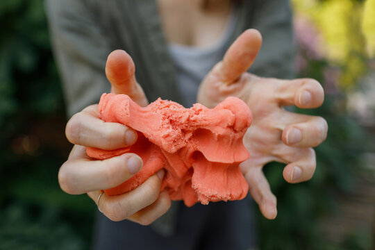 Color dough in hands
