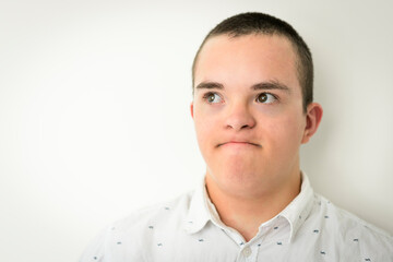 Fototapeta premium kid with Down syndrome over white background
