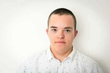 Fototapeta premium kid with Down syndrome over white background