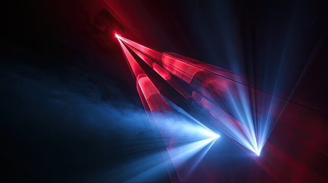 Red and blue laser beams crisscross in hazy darkness, creating light shafts