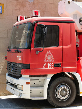 Greece, Rhodes, August 17. 2026, front cabin of a red Mercedes-Benz Actros fire engine belonging to the Hellenic Fire Service (Pyrosvestiko Soma) in Greece