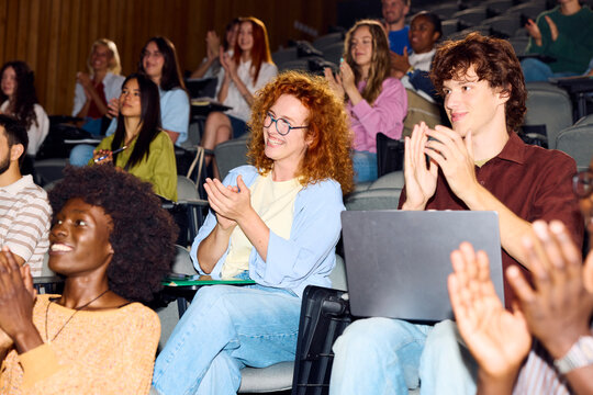 Students Clapping During a Presentation