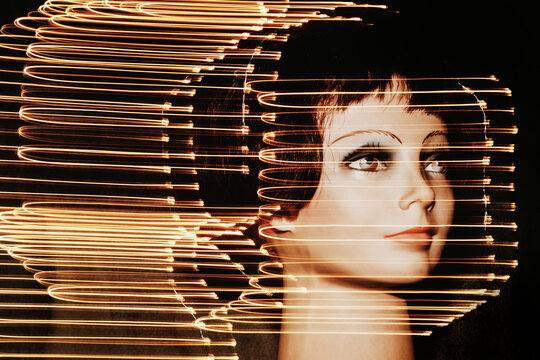 Mannequin With Light Trails in a Dark Setting
