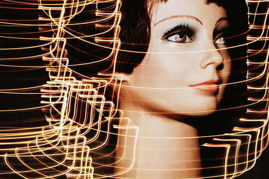 Long exposure conceptual portrait featuring a vintage mannequin head 