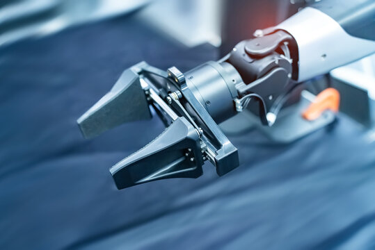 automatic gripping and smart robot working on smart factory,industry 4.0 and technology.