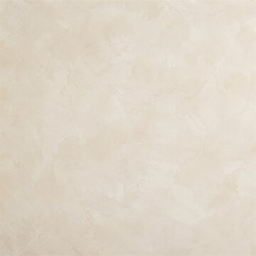 Cream limewash plaster wall background with soft brush strokes and warm ambient light